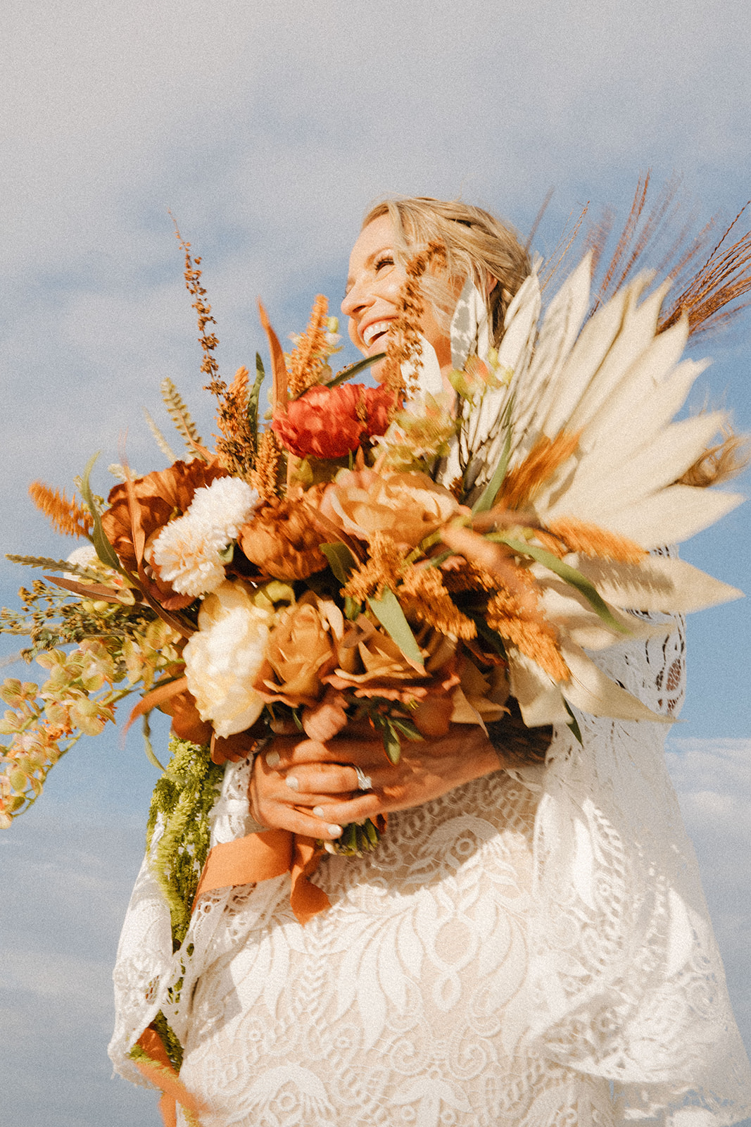 stunning white sands elopement floral arrangements