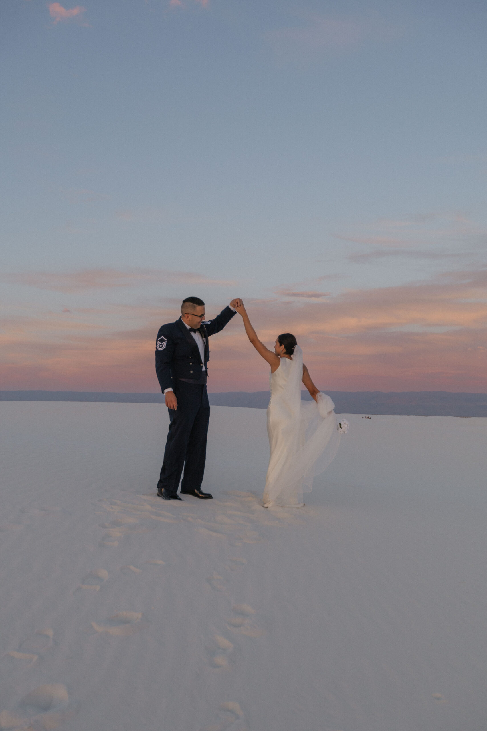 beautiful bride and groom pose together after their dreamy elopement