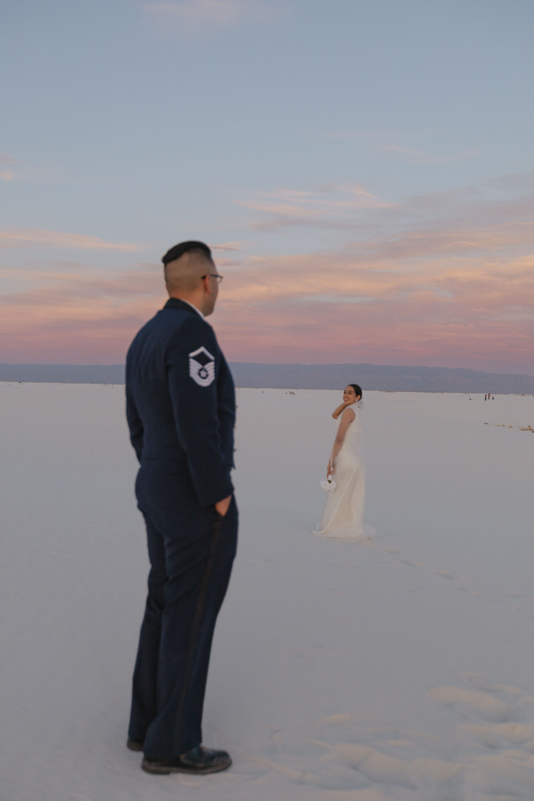 beautiful bride and groom pose together after their dreamy elopement