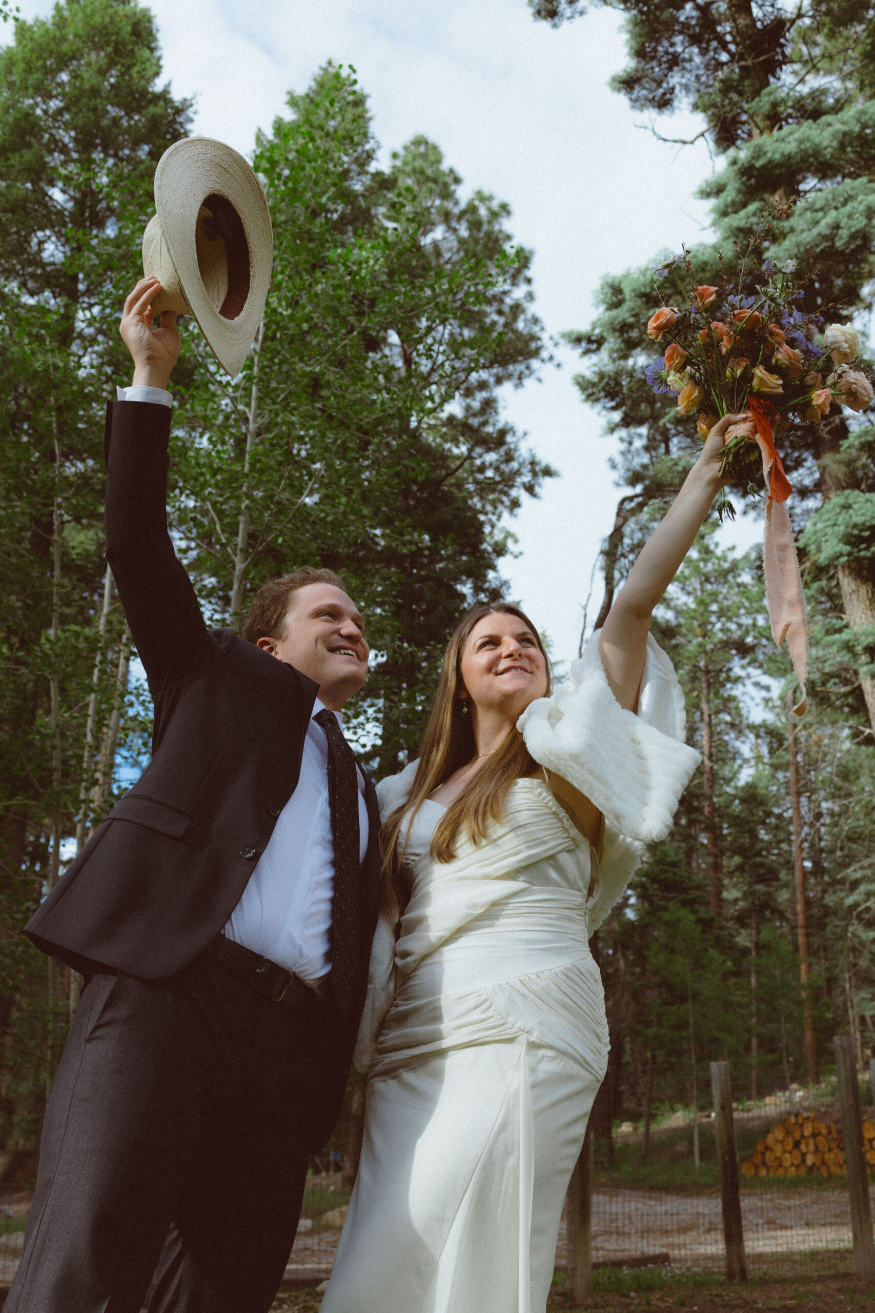 bride and groom pose together in the New Mexico nature