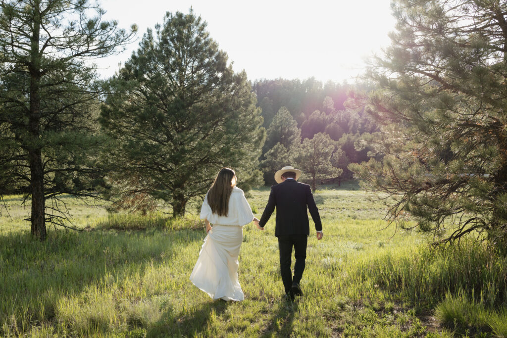 bride and groom pose together after their unique New Mexico elopement