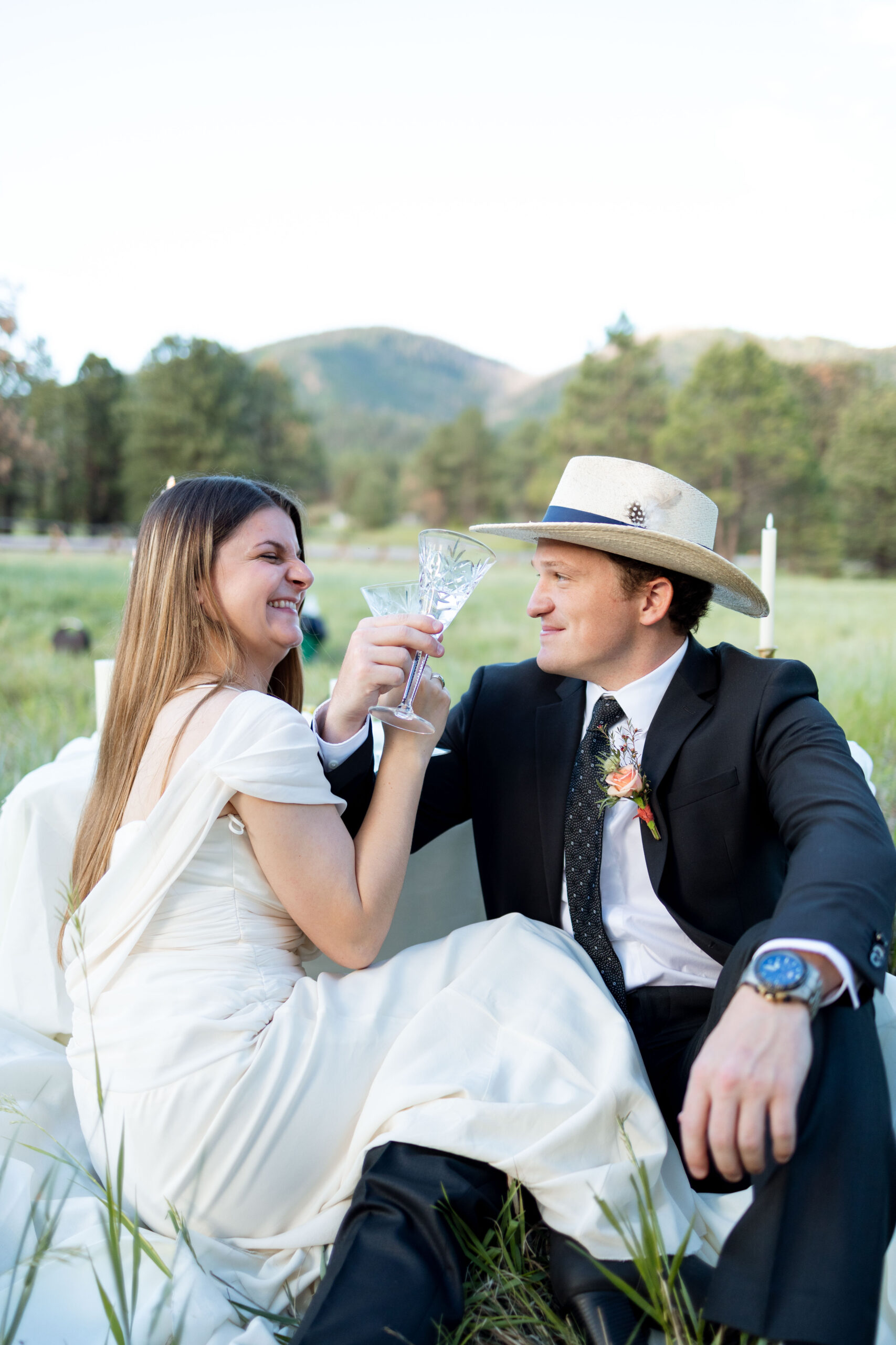 bride and groom pose together after their unique New Mexico elopement