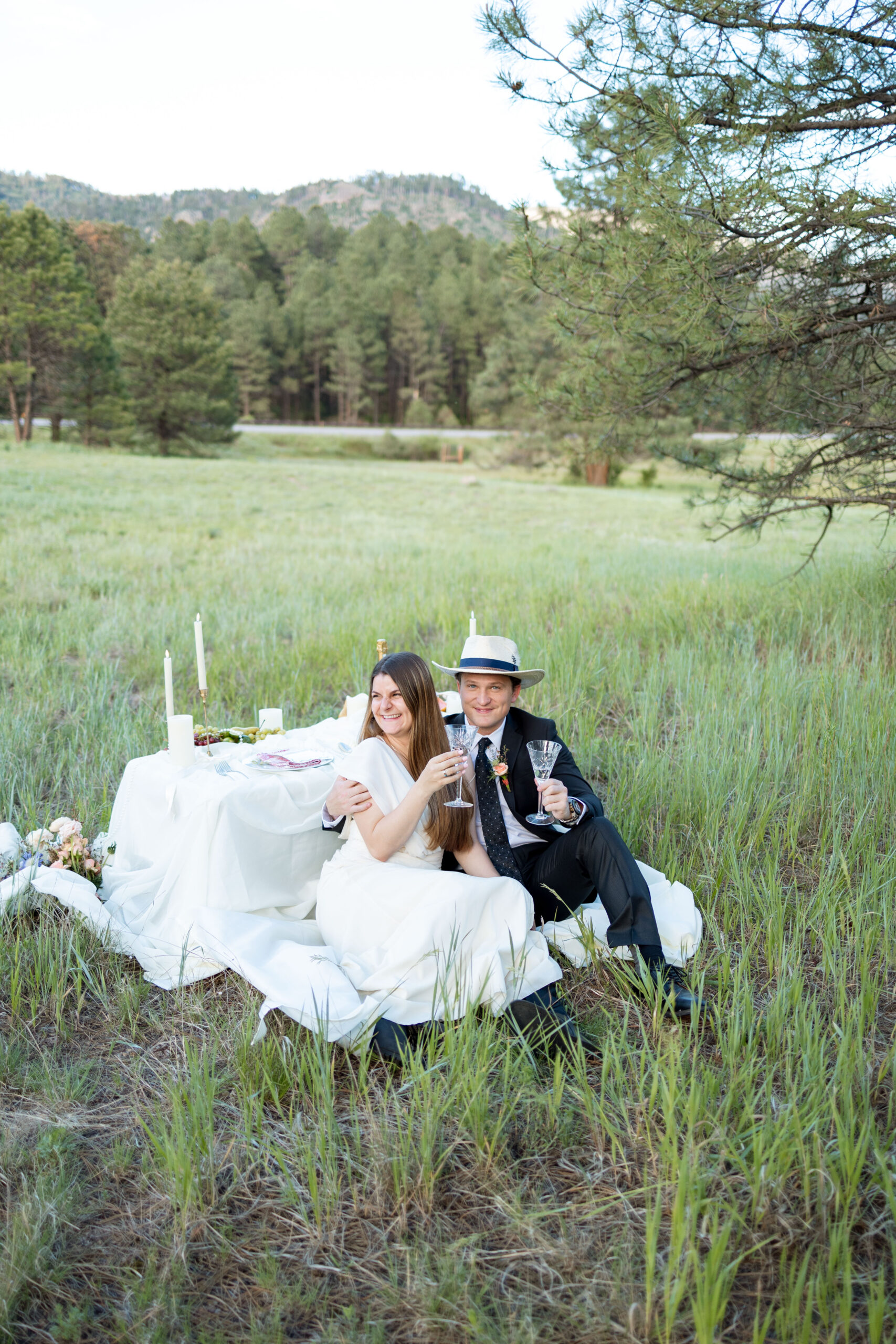 bride and groom pose together in the New Mexico nature