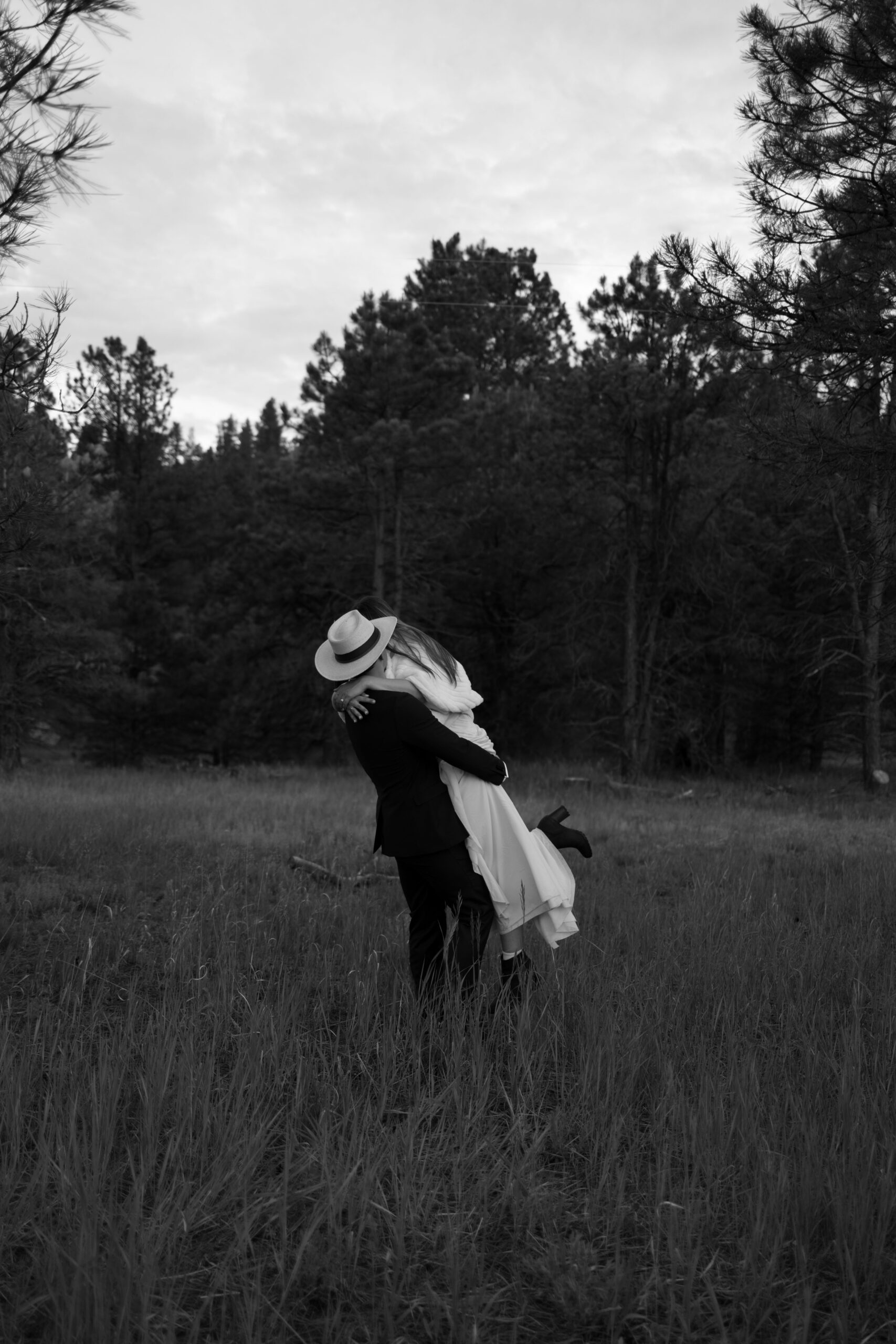 bride and groom pose together after their unique New Mexico elopement