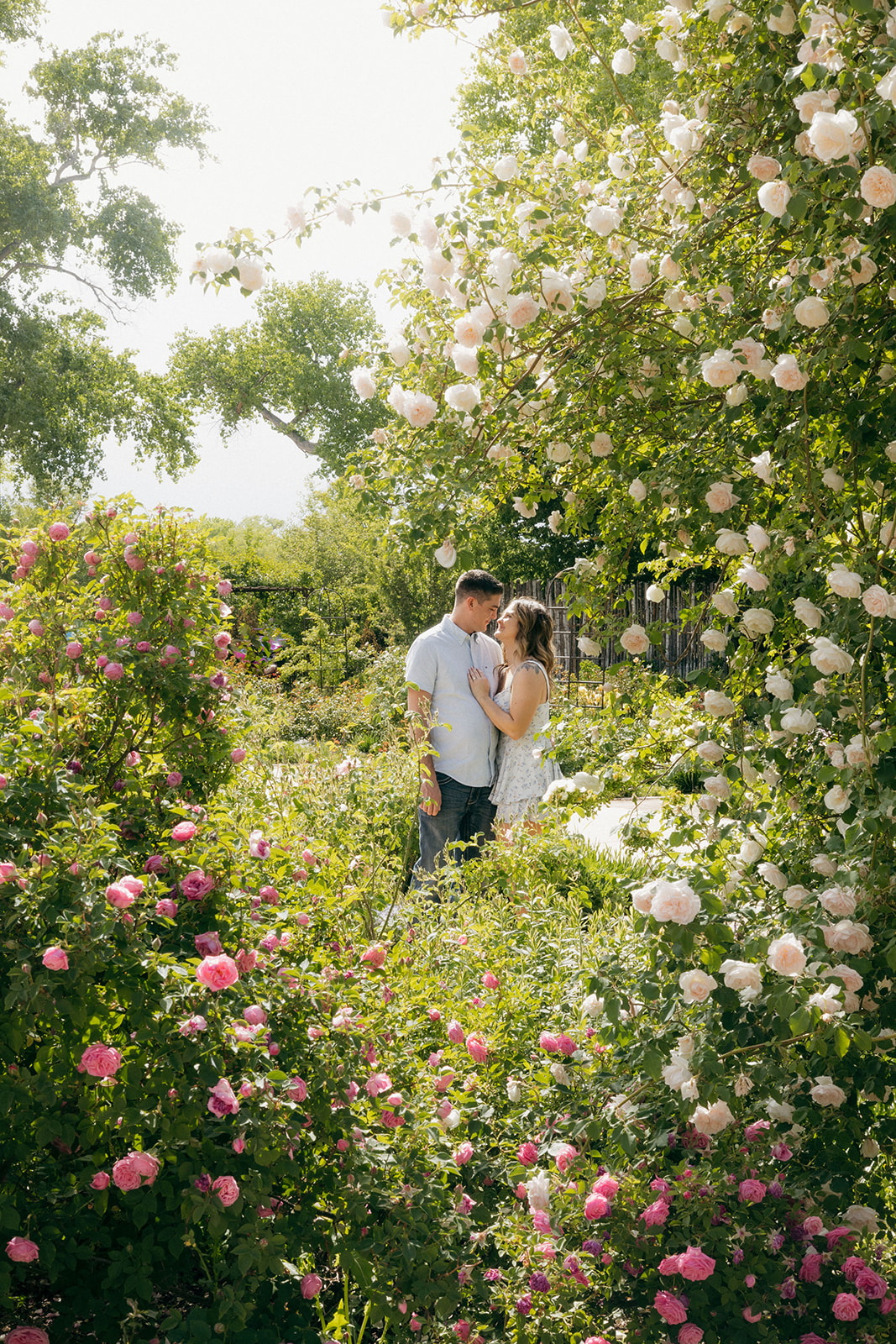 stunning couple pose together during their engagement photos