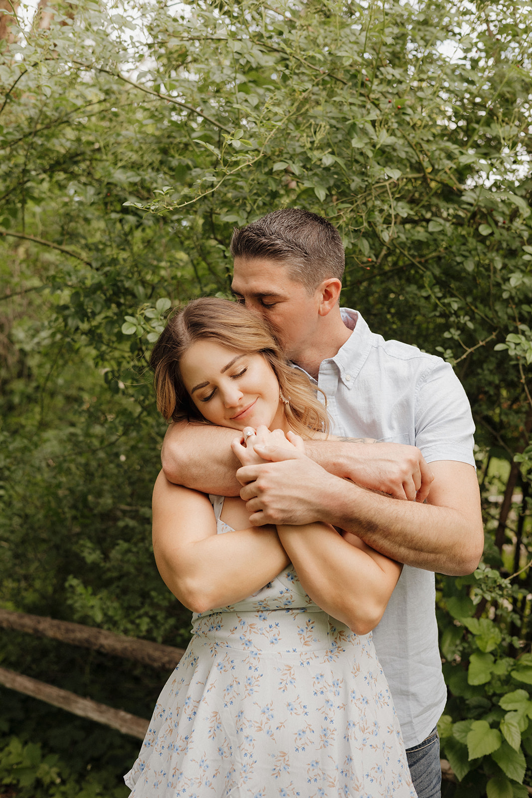 stunning couple pose together during their engagement photos