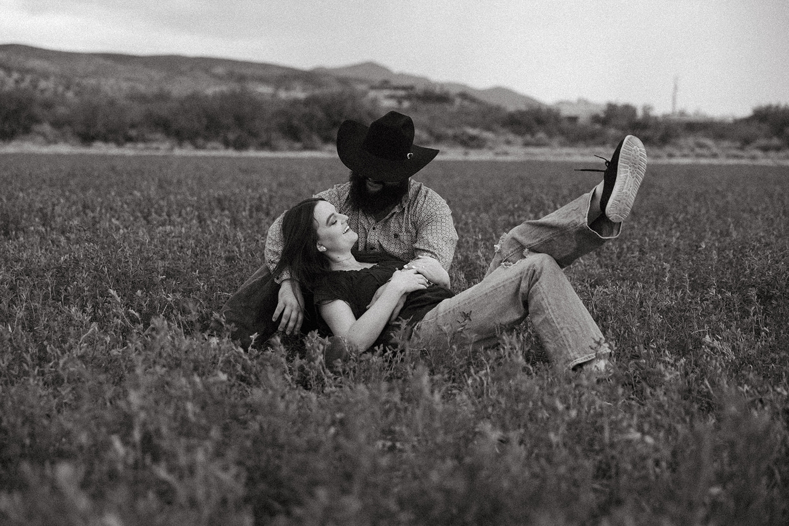 stunning couple pose together during their engagement photos