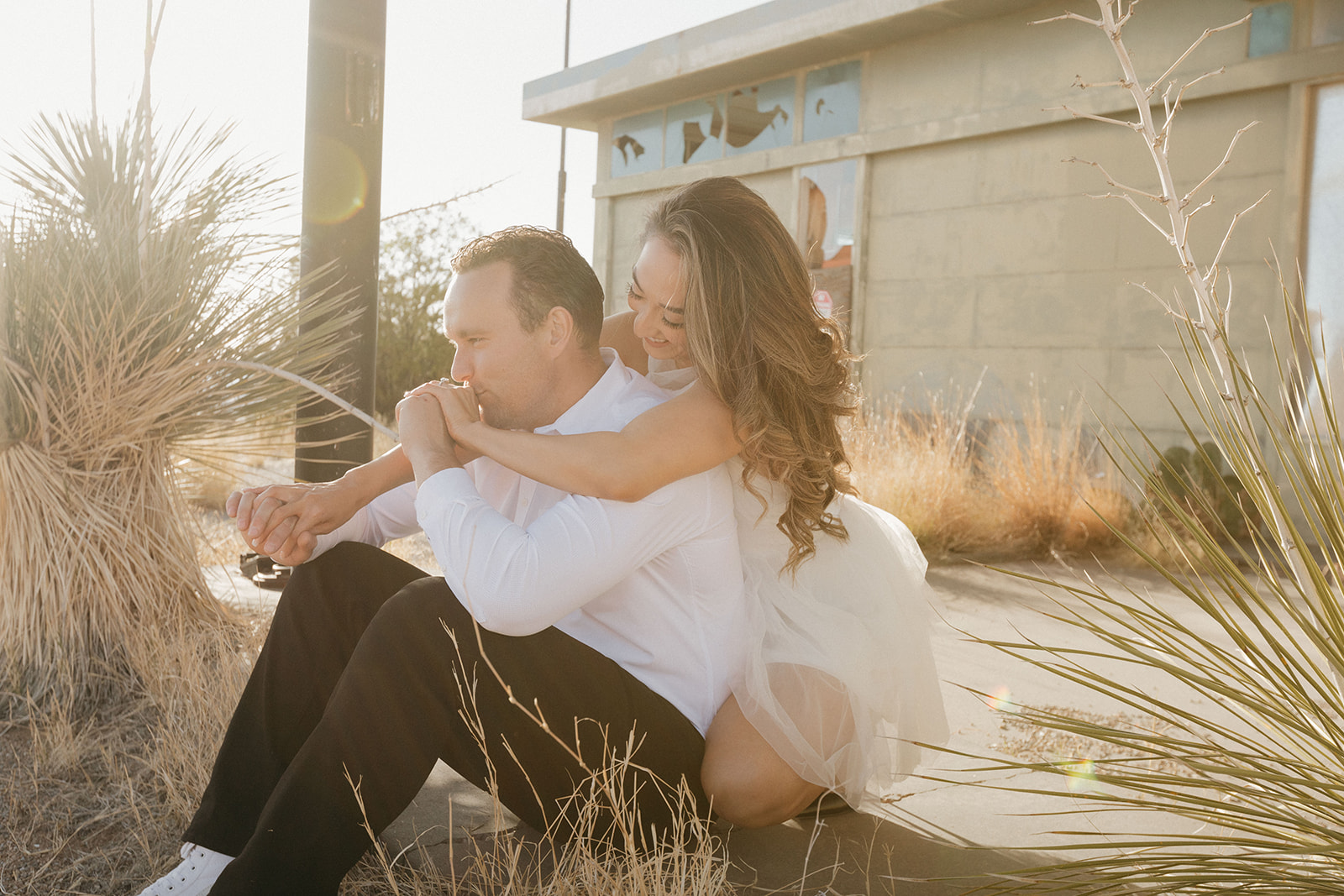 stunning couple pose together during their engagement photos