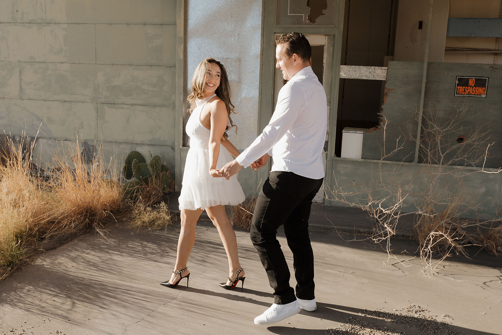 stunning couple pose together during their engagement photos