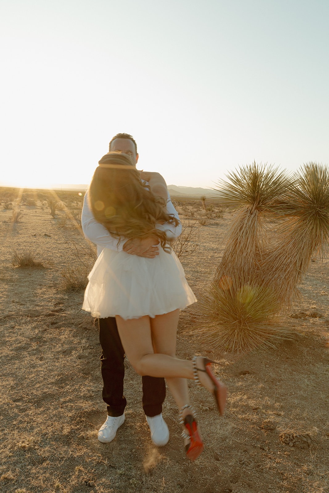 stunning couple pose together during their engagement photos