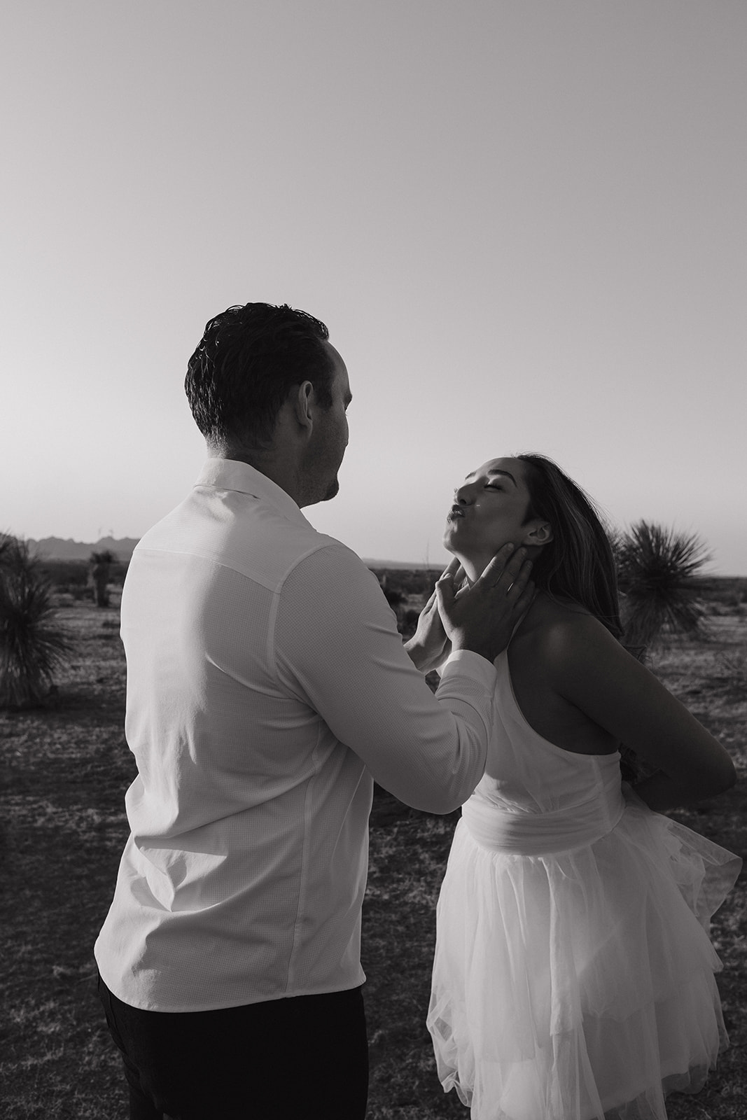 stunning couple pose together during their engagement photos