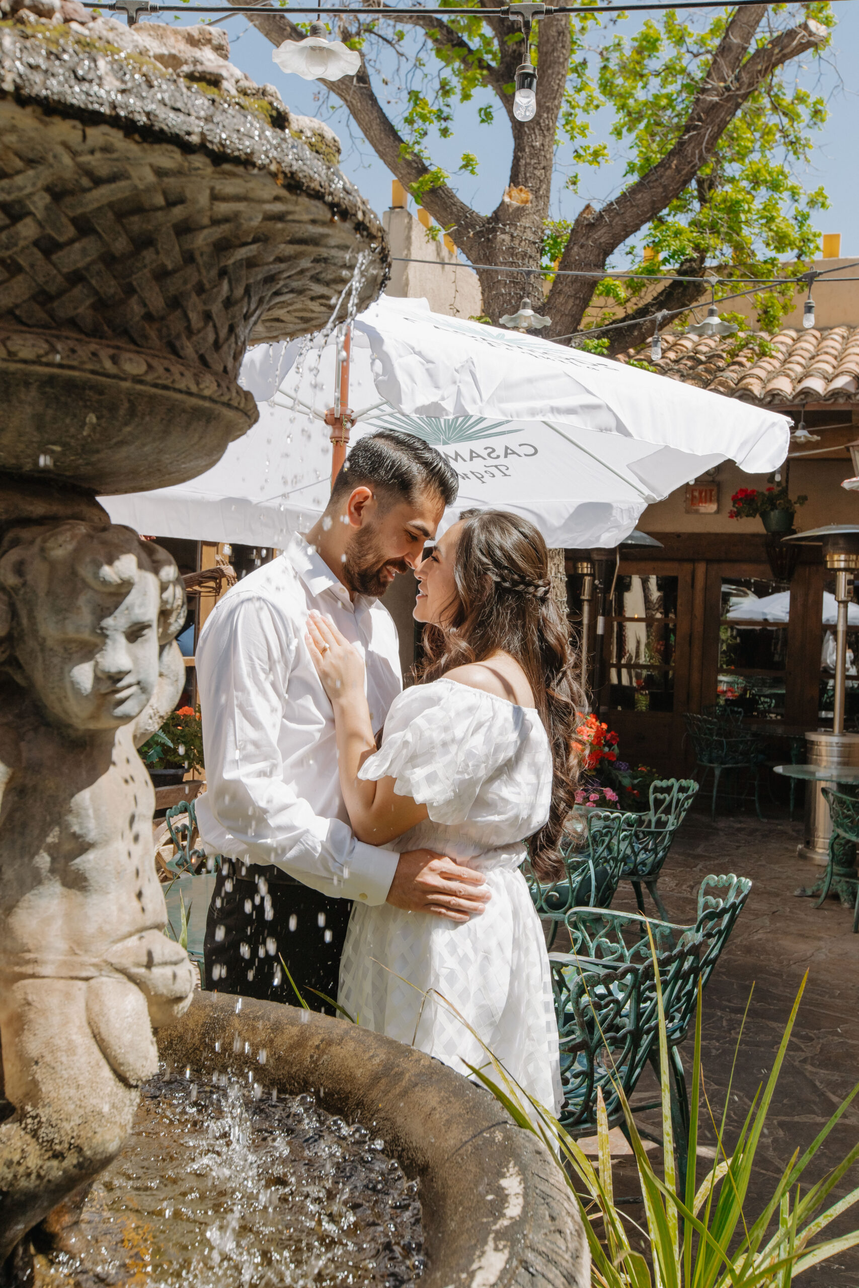 stunning couple pose together during their engagement photos