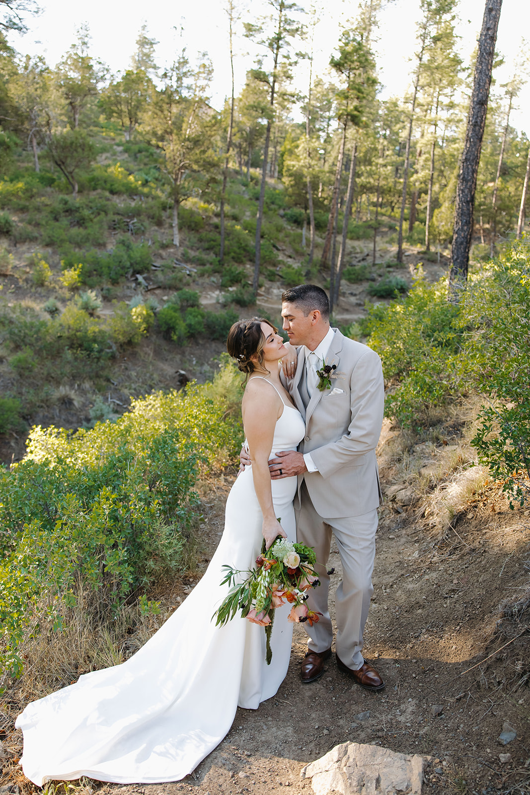 beautiful bride and groom pose on their elopement day