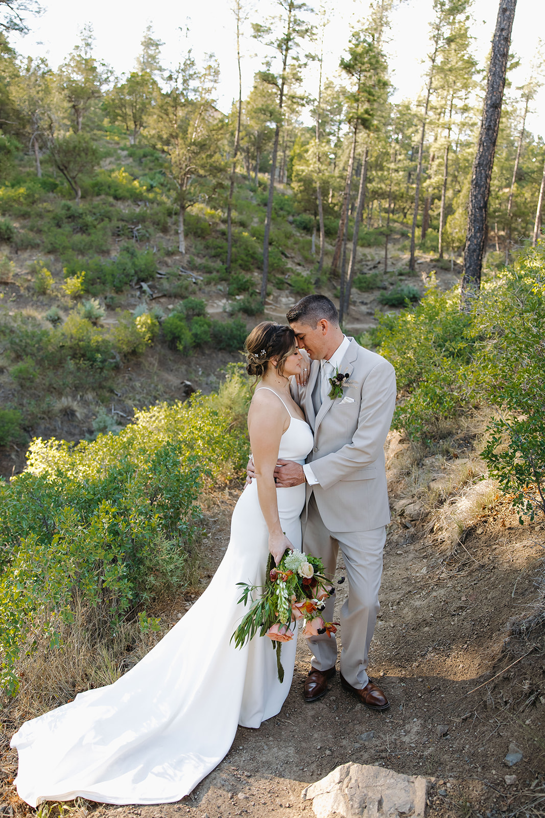 beautiful bride and groom pose on their elopement day