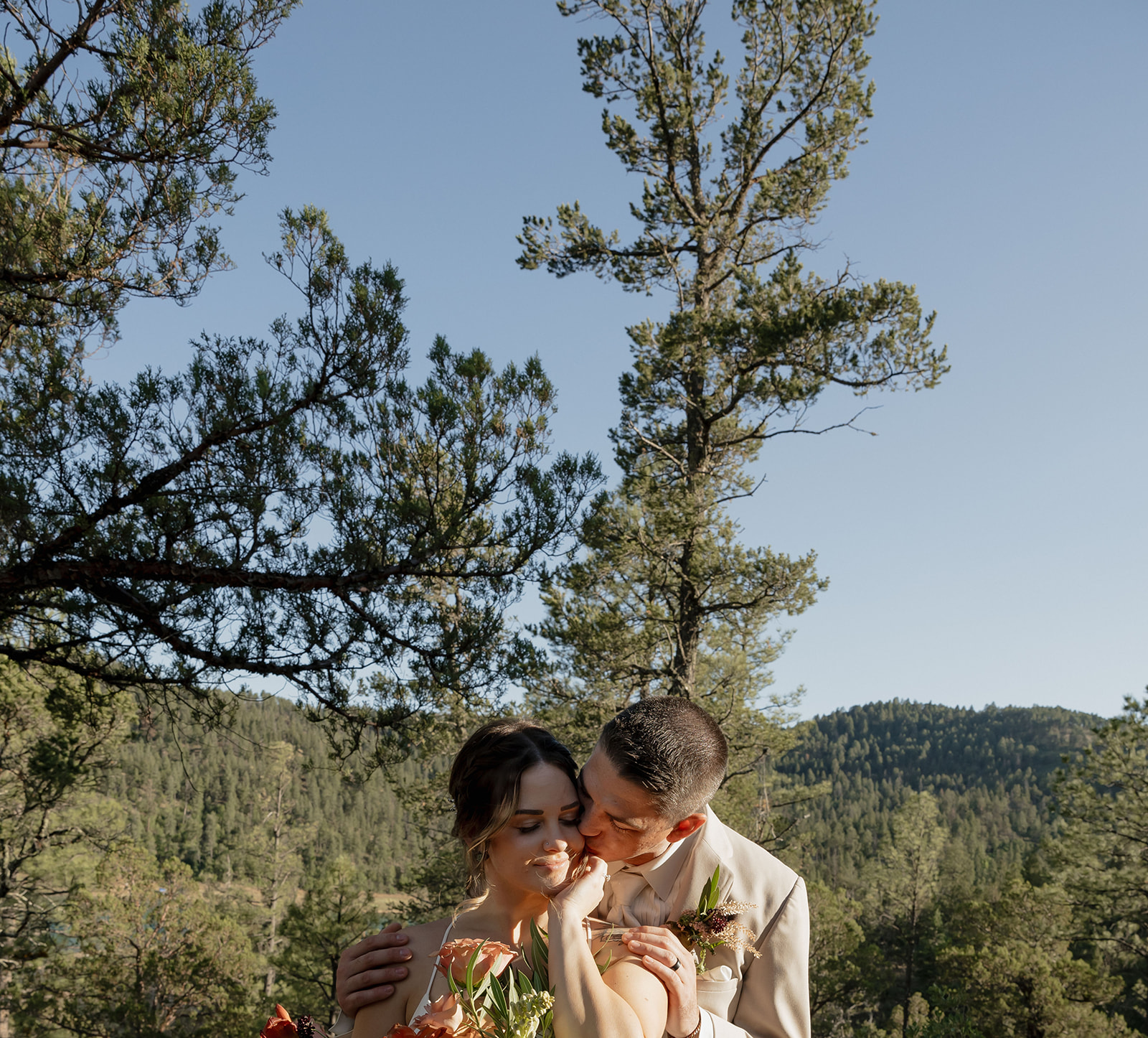 beautiful bride and groom pose on their elopement day