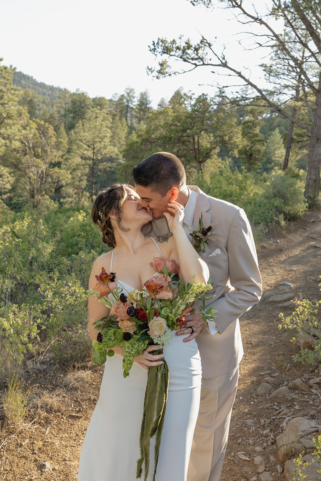 beautiful bride and groom pose on their elopement day