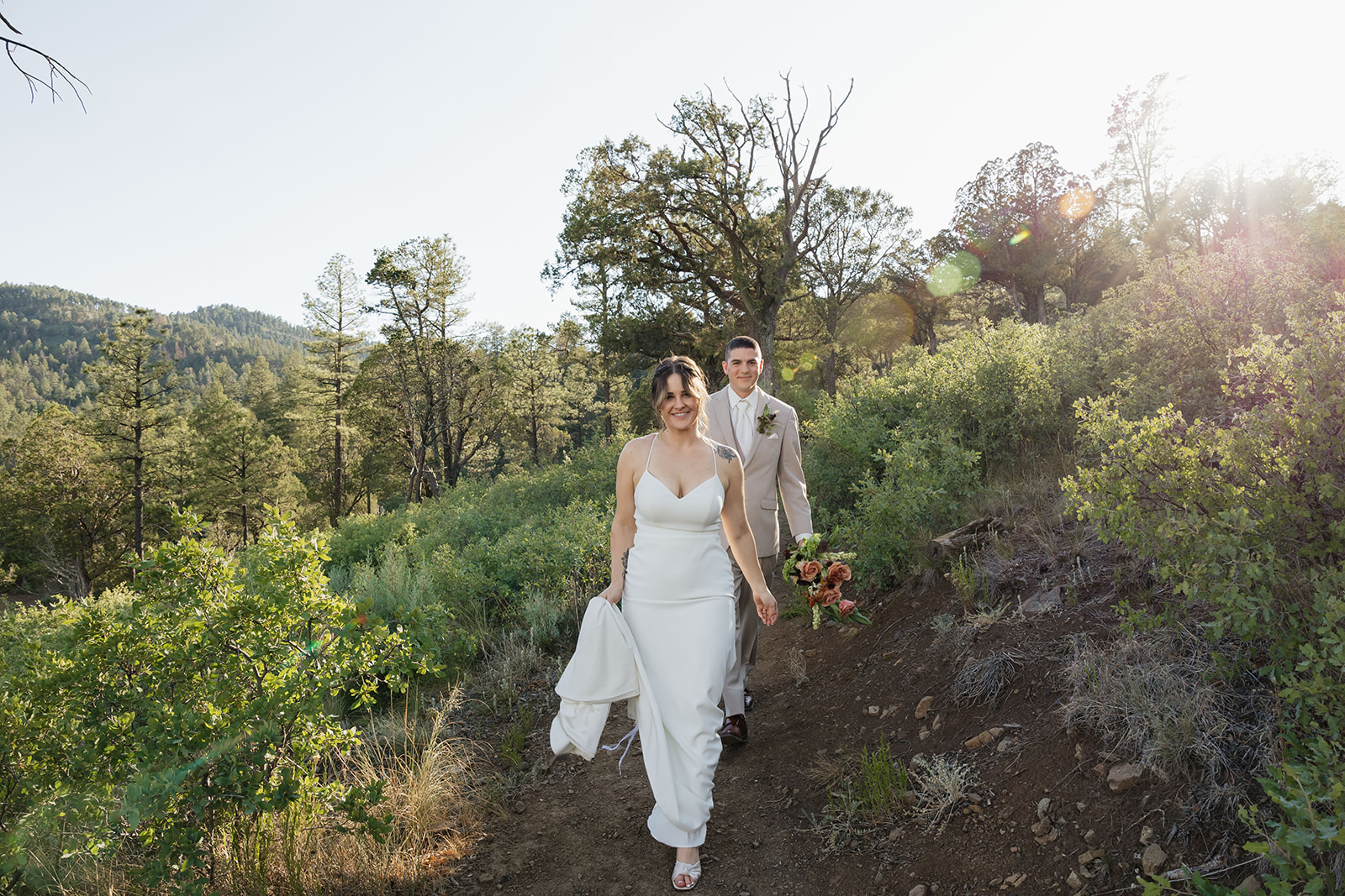 beautiful bride and groom pose on their elopement day