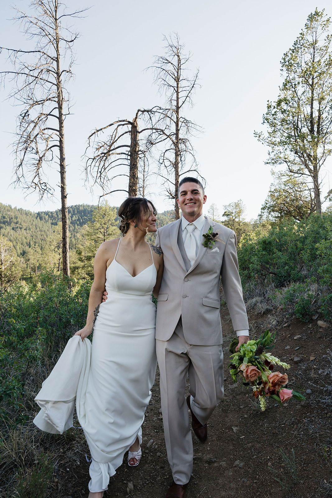 beautiful bride and groom pose on their elopement day