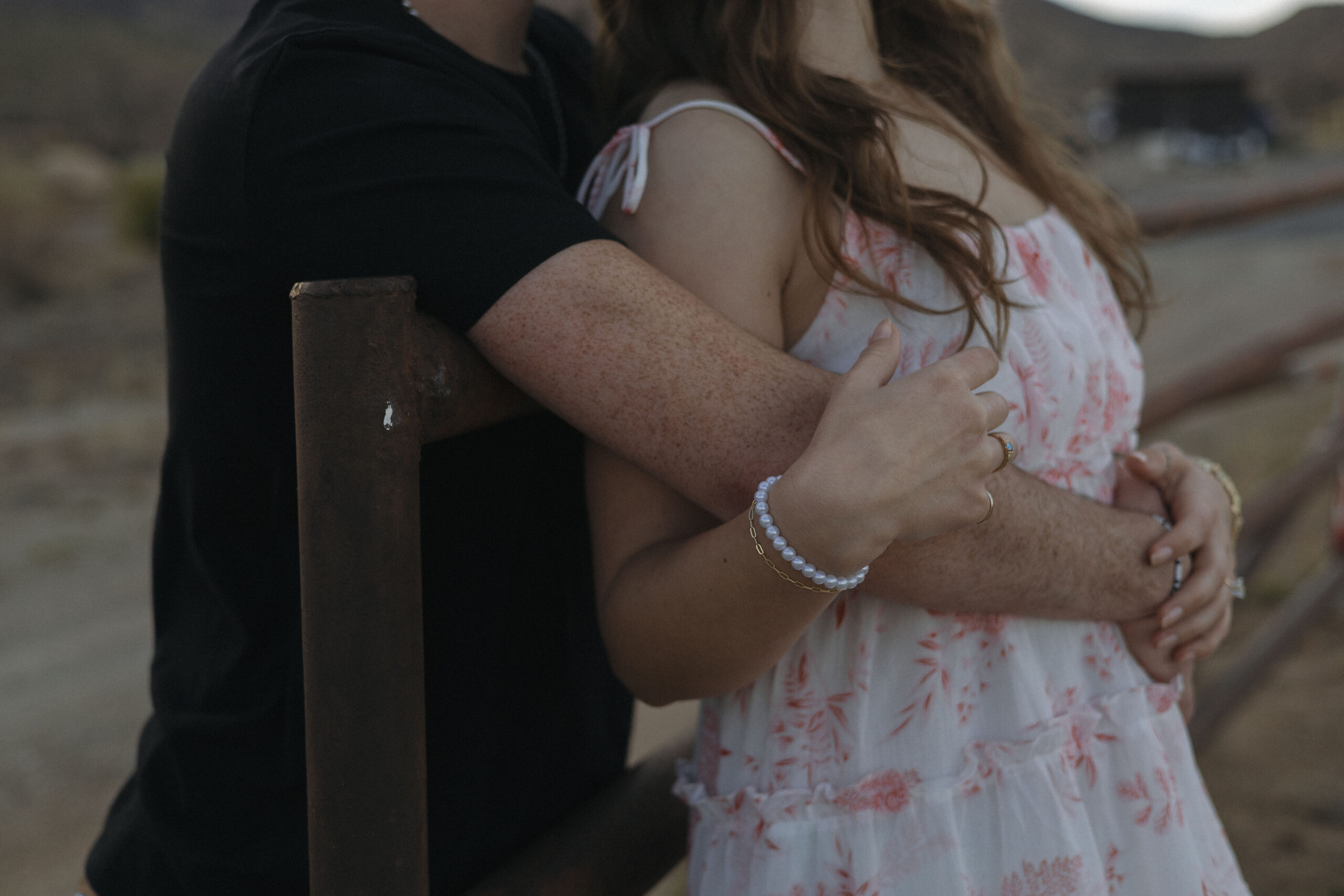 beautiful couple pose together during their engagement photo session