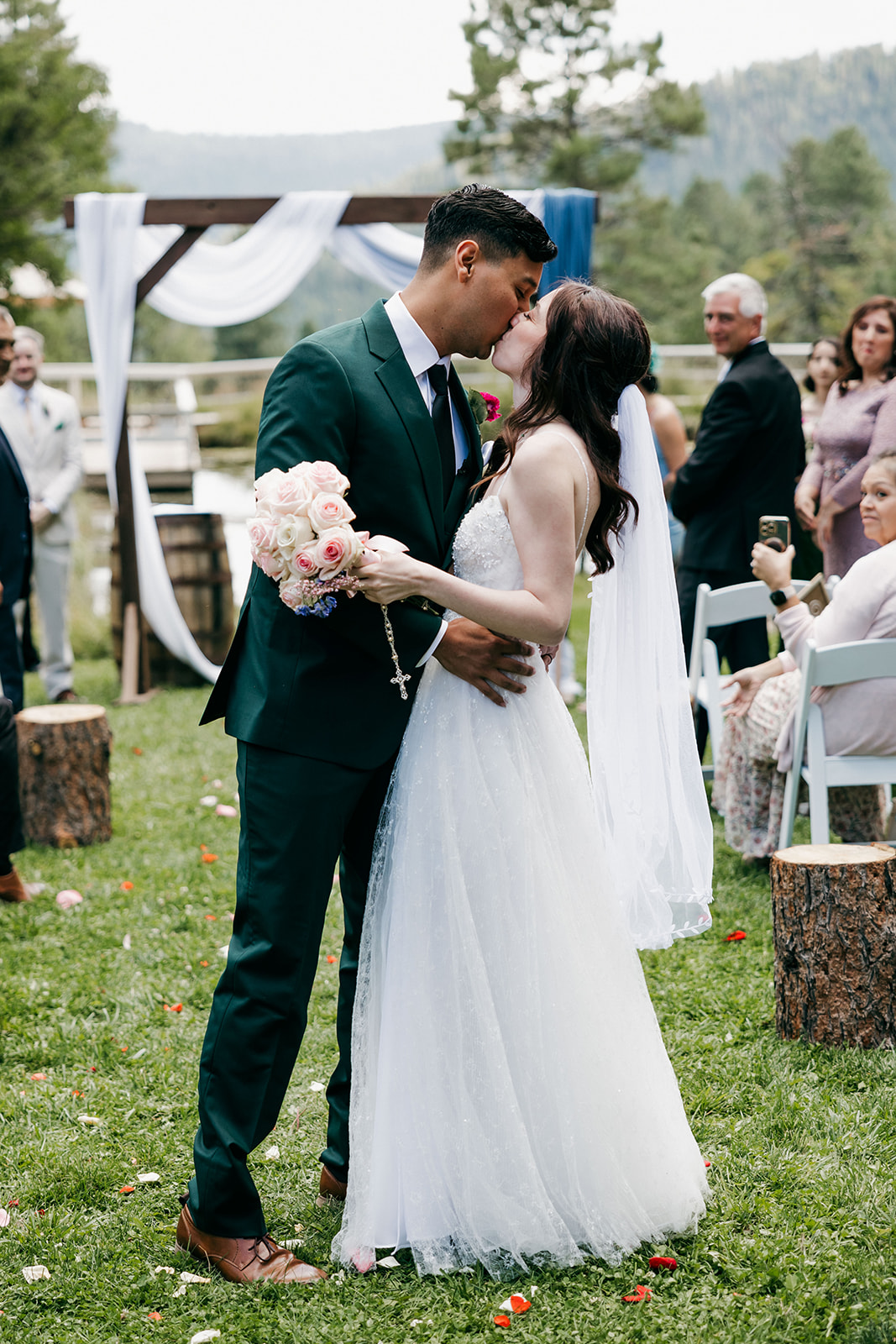 beautiful bride and groom pose for a photo on their wedding day