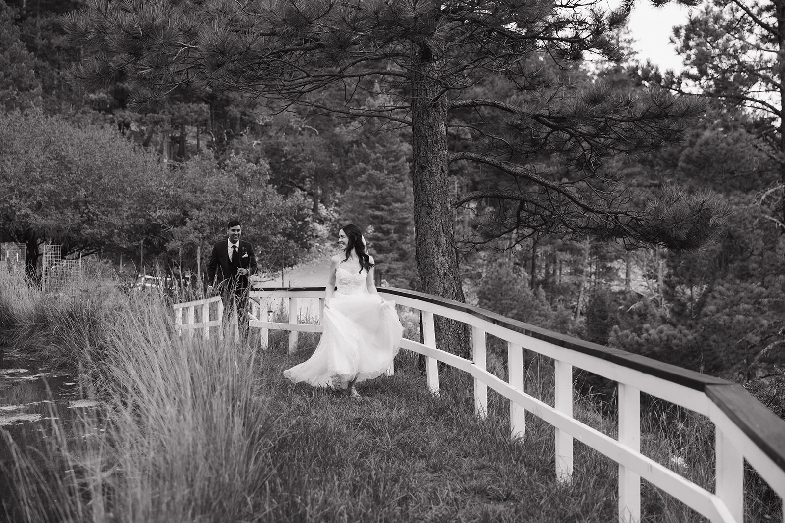 beautiful bride and groom pose for a photo on their wedding day