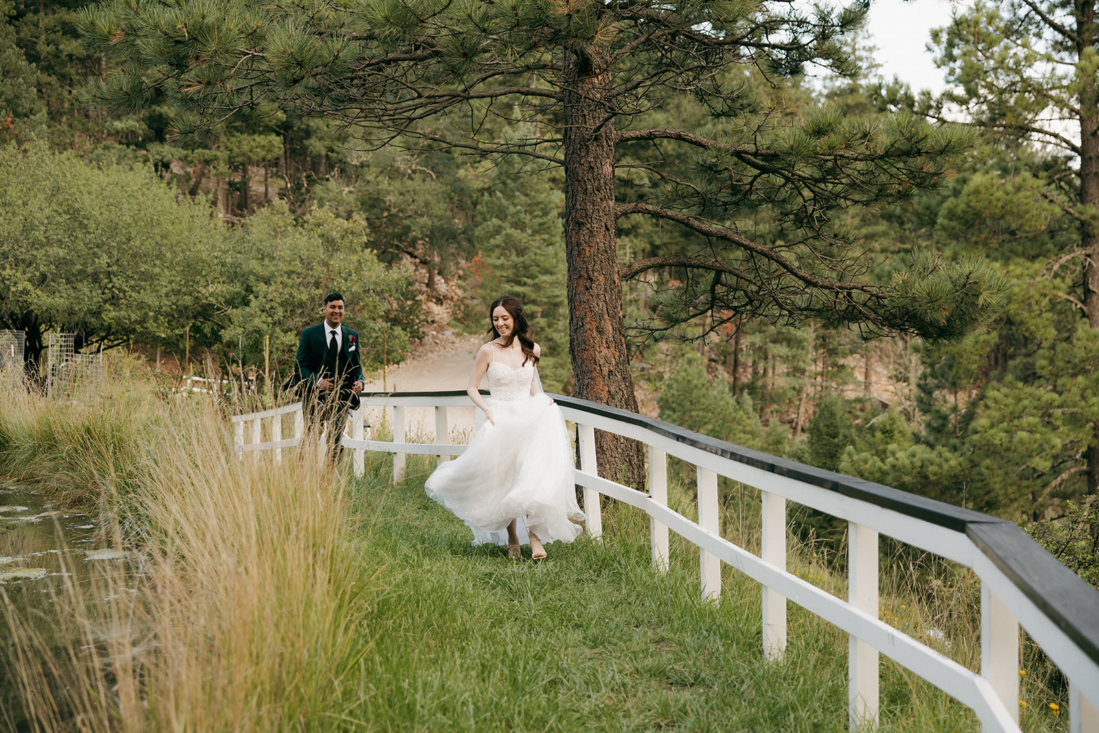 beautiful bride and groom pose for a photo on their wedding day