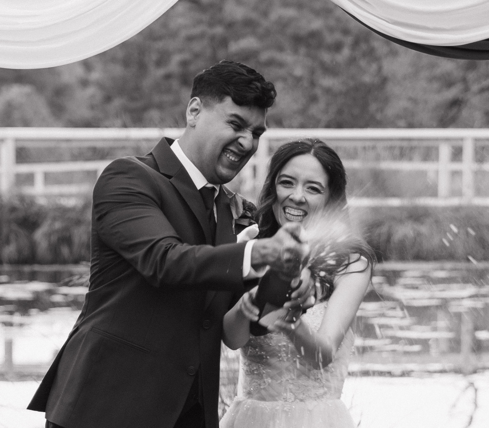 beautiful bride and groom take portraits together 